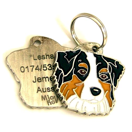 <h3>Custom personalized dog name tag Australian shepherd tricolor</h3>
This unique, cute and quality dog id tag is offered with laser-engraved name and phone number or your custom text. It comes with a stainless steel split ring for easy attachment to your pet’s collar. All items are also available as keychains.
A perfect gift for dogs and dog lovers.

<strong>Color:</strong> colored/silver
<strong>Size:</strong> 29 x 30 mm (1.14 x 1.18 inch)
<strong>Engraving area:</strong> 20 x 18 mm (0.79 x 0.71 inch); recommended layout up to 4 lines, 15 characters per line.

Laser engraving on the back side is included in the price. Please enter the text you would like engraved (recommended: dog’s name and phone number). The engraving will be centered and easy to read. 
<strong>Important:</strong> If you exceed the recommended text length, the engraving will be significantly smaller and may become difficult to read. For best readability, we strongly recommend keeping the text short and clear.

Metal, chrome plated dog tag or key ring. 
Hand made, hand colored, made in Slovenia. 

In stock.

<h3>About the breed – Australian shepherd tricolor</h3>
<section>
<h2>Australian Shepherd (Aussie): Characteristics & Care</h2>
<p>The <strong>Australian Shepherd</strong> (Aussie) is a medium-sized, highly intelligent and energetic dog breed that was developed in the United States despite its name. It belongs to the <strong>FCI Group 1 (Sheepdogs and Cattle Dogs)</strong>. Known for its striking coat patterns, often with merle coloring, and expressive eyes, it was bred as a <strong>working and herding dog</strong>.</p>
<h3>Temperament and Family Life</h3>
<p>Australian Shepherds are extremely loyal, affectionate with their families, and excellent with children when properly socialized. They are <strong>alert, attentive, and protective</strong>, making them reliable watchdogs, while remaining friendly and devoted. Their high intelligence and eagerness to please make them highly trainable, though they require consistent mental stimulation.</p>
<h3>Physical Requirements & Exercise</h3>
<p>To live a healthy and fulfilled life, an Australian Shepherd needs:</p>
<ul>
<li><strong>Daily Exercise:</strong> Intensive physical activity, long walks, running, and challenging tasks.</li>
<li><strong>Environment:</strong> An active home with space and opportunities for work or play.</li>
<li><strong>Grooming:</strong> Regular brushing of the medium-length <strong>double coat</strong> to maintain its condition.</li>
</ul>
<p><strong>Pro Tip:</strong> A personalized engraved dog tag enhances the Aussie’s distinctive look while providing a practical and stylish form of identification.</p>
</section>

